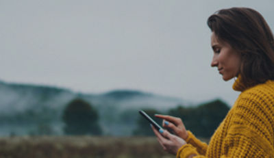 Girl outside on phone